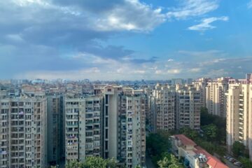 white concrete building under blue sky during daytime