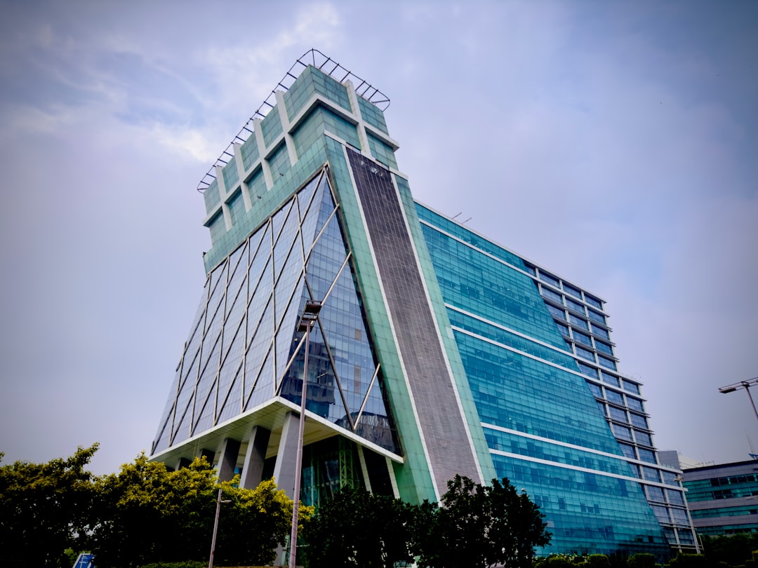 a very tall building with a sky background