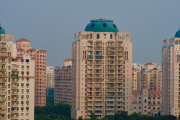 a group of tall buildings in a city